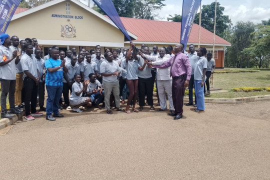 The Principal (Purple shirt) flags off UTC Kyema Team for the Inter-collegiate Games.